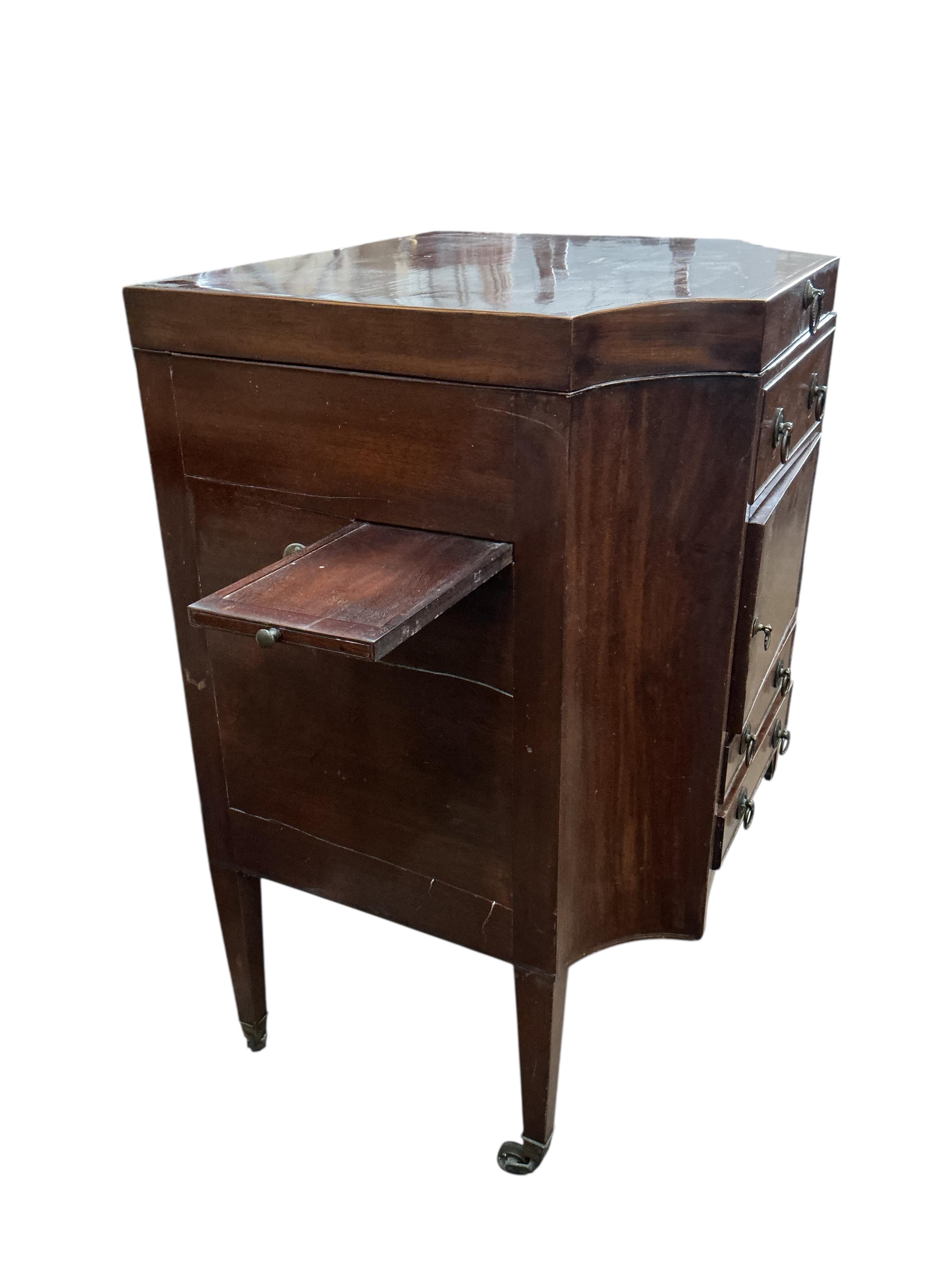 A George III mahogany enclosed washstand, damaged, width 58cm, height 92cm